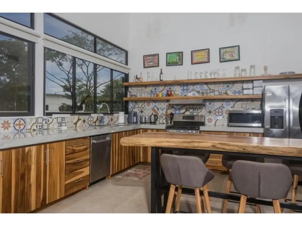 Discover the perfect balance between modern design, tropical comfort, and prime location in this stunning 3-bedroom, 3.5-bathroom home located in the exclusive Tamarindo Park community, ..., photo 3