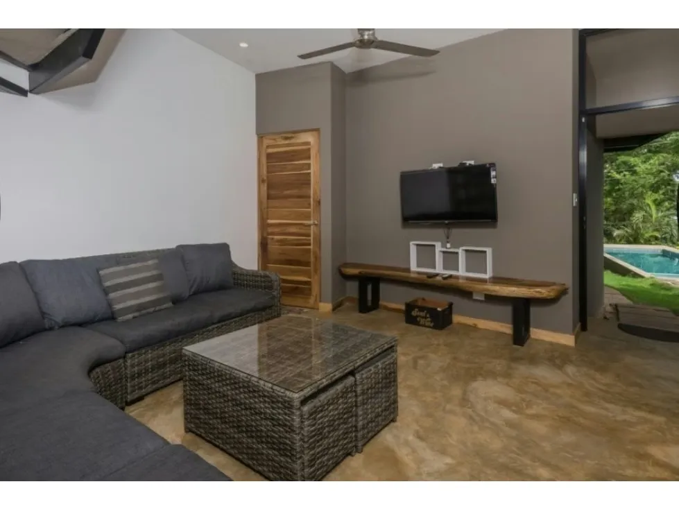 Discover the perfect balance between modern design, tropical comfort, and prime location in this stunning 3-bedroom, 3.5-bathroom home located in the exclusive Tamarindo Park community, ..., photo 5