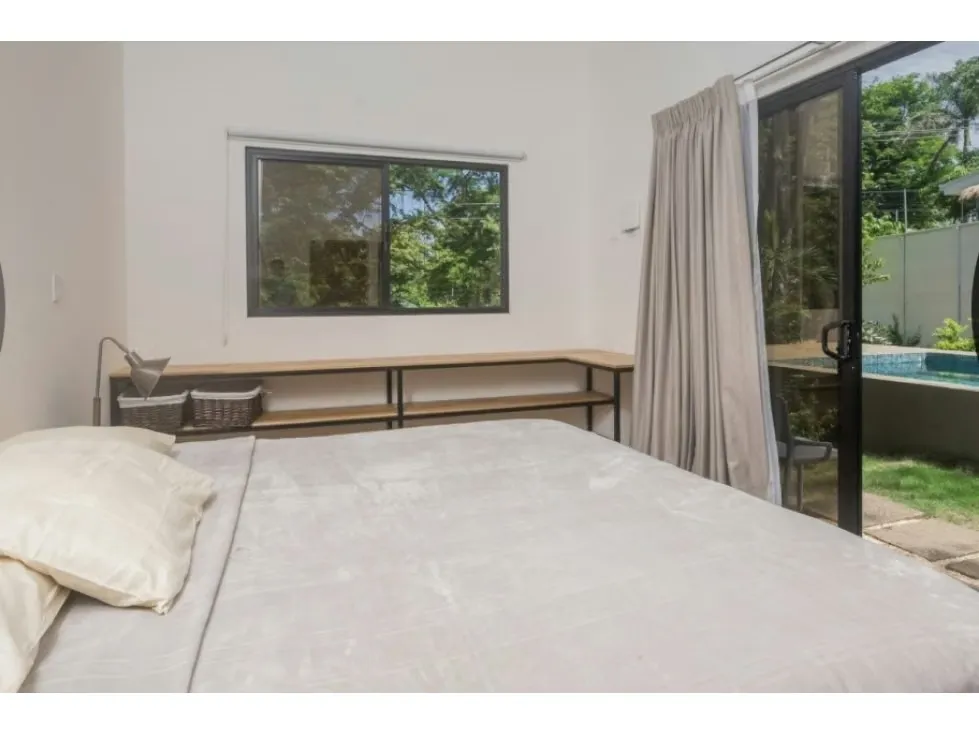 Discover the perfect balance between modern design, tropical comfort, and prime location in this stunning 3-bedroom, 3.5-bathroom home located in the exclusive Tamarindo Park community, ..., photo 10