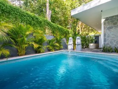 Impresionante casa tropical moderna de mediados de siglo con 3 dormitorios, a pasos de la playa., photo 7