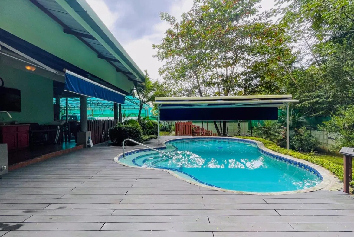 PROPERTY WITH THREE BEDROOM HOME AND PUBLIC ROAD IN FRONT, IN UVITA – 0.24 ACRES, photo 2