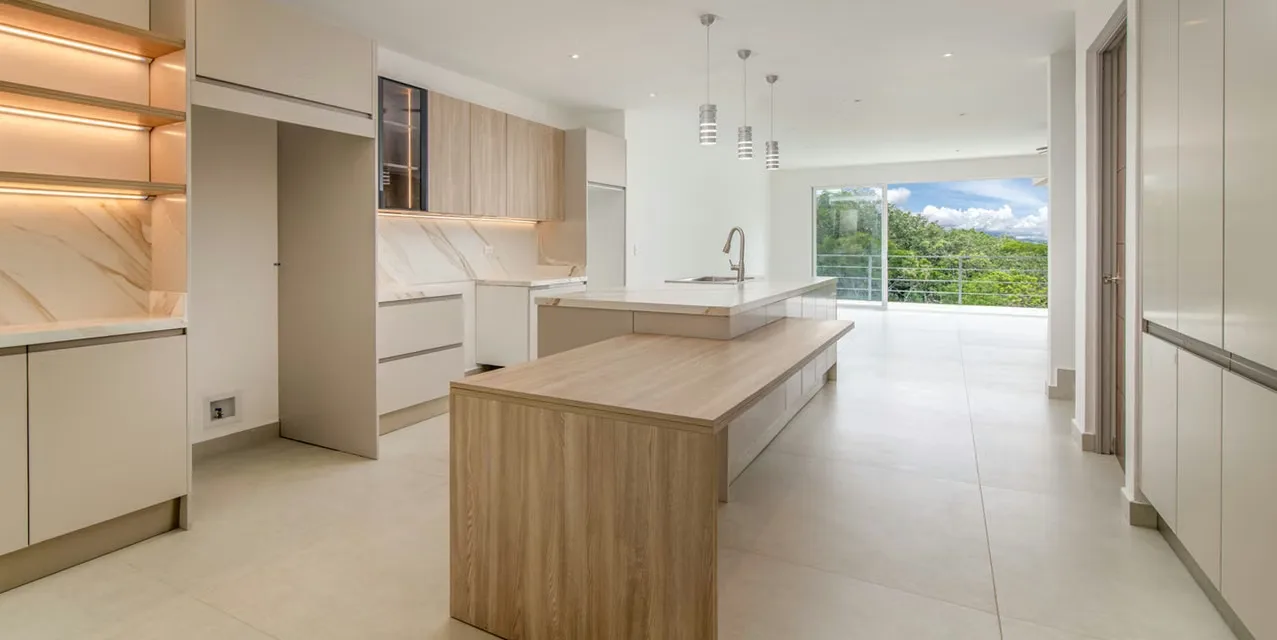 4-bedroom brand new home in Escazú with mountain views, modern kitchen, private suite, and community pool in gated Condominio Lomas 2370, Costa Rica.