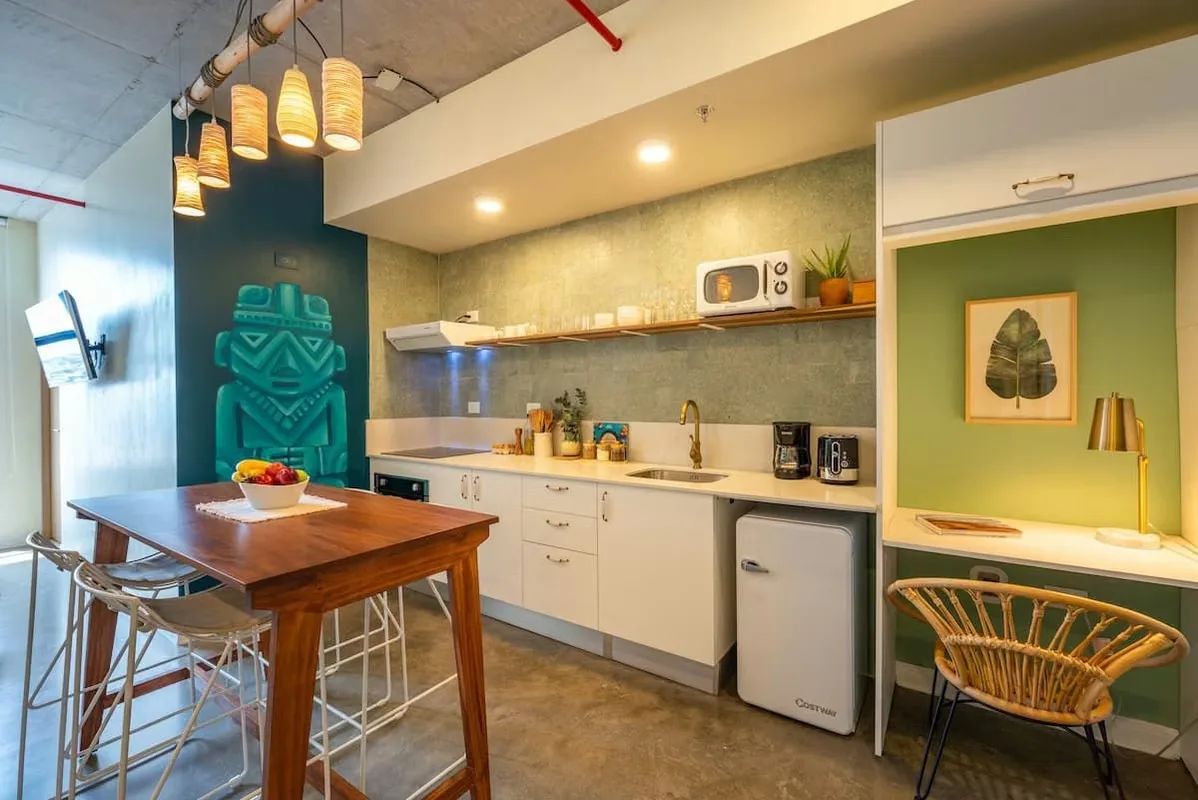 Enjoy a unique stay in this stylish tropical-inspired studio, designed to provide comfort, elegance, and a great urban experience.