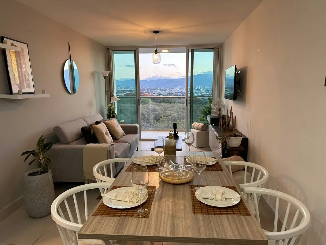 The apartment has a master bedroom with a queen bed, with a full bathroom, reading table, ...