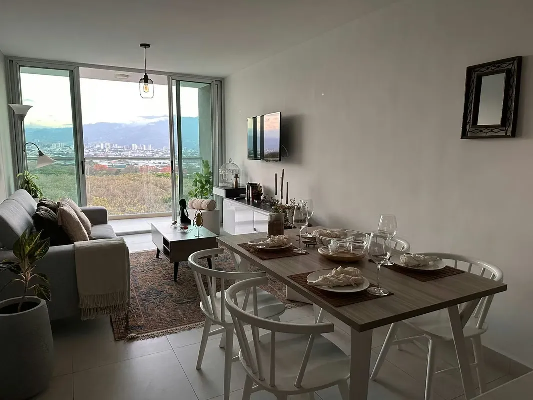 The apartment has a master bedroom with a queen bed, with a full bathroom, reading table, ..., photo 3