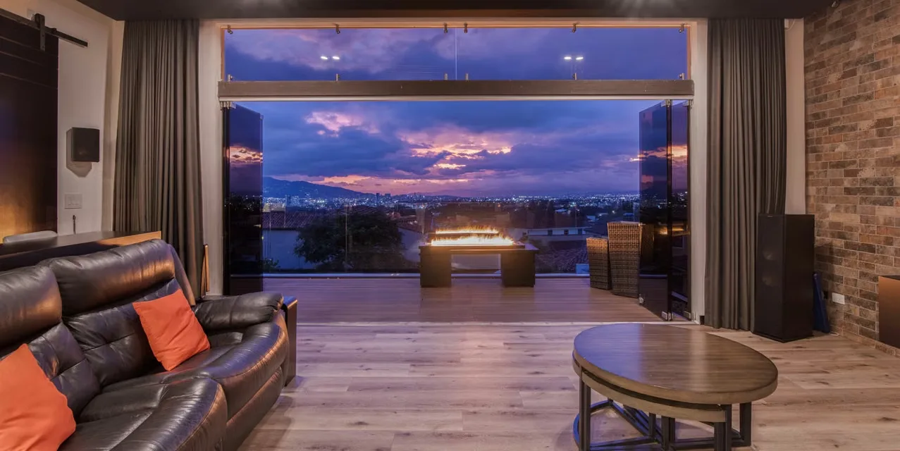 3-bedroom contemporary home with jacuzzi, city views, cinema room, and triple-level security in Bosques de Altamonte, Curridabat, Costa Rica.