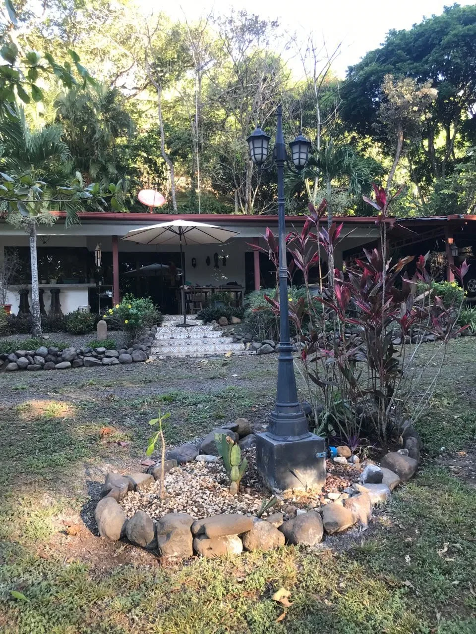 Countryside home in a farm setting next to primary forest with stream – 400051521088