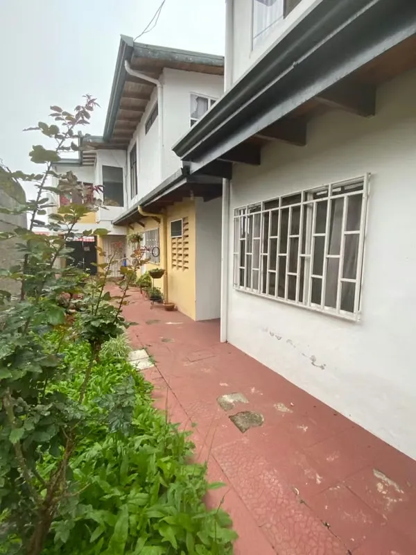 The building comprises four apartments and each of them has two bedrooms, a bathroom, a dining room with an integrated kitchen, a laundry room, a backyard and a front garden., photo 8