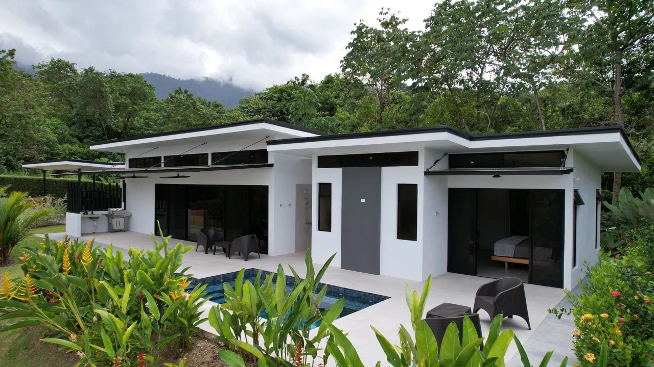 TROPICAL HOME WITH POOL AND SOLAR POWER IN PHASE 11 OF OJOCHAL – 1.41 ACRES