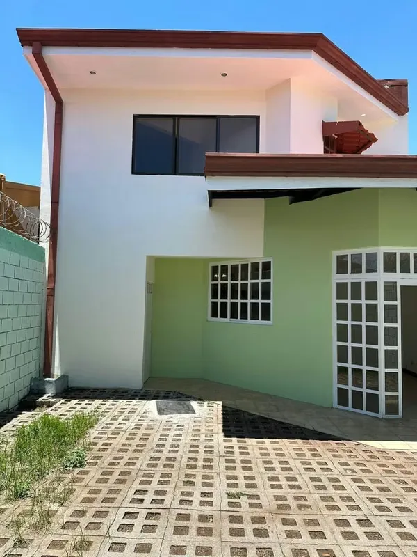 Spacious living/dining room with large window