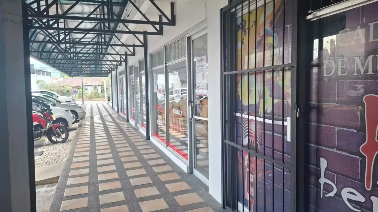 These include a pharmacy, beauty salon, restaurants, sportswear stores, and dance and music schools., photo 2