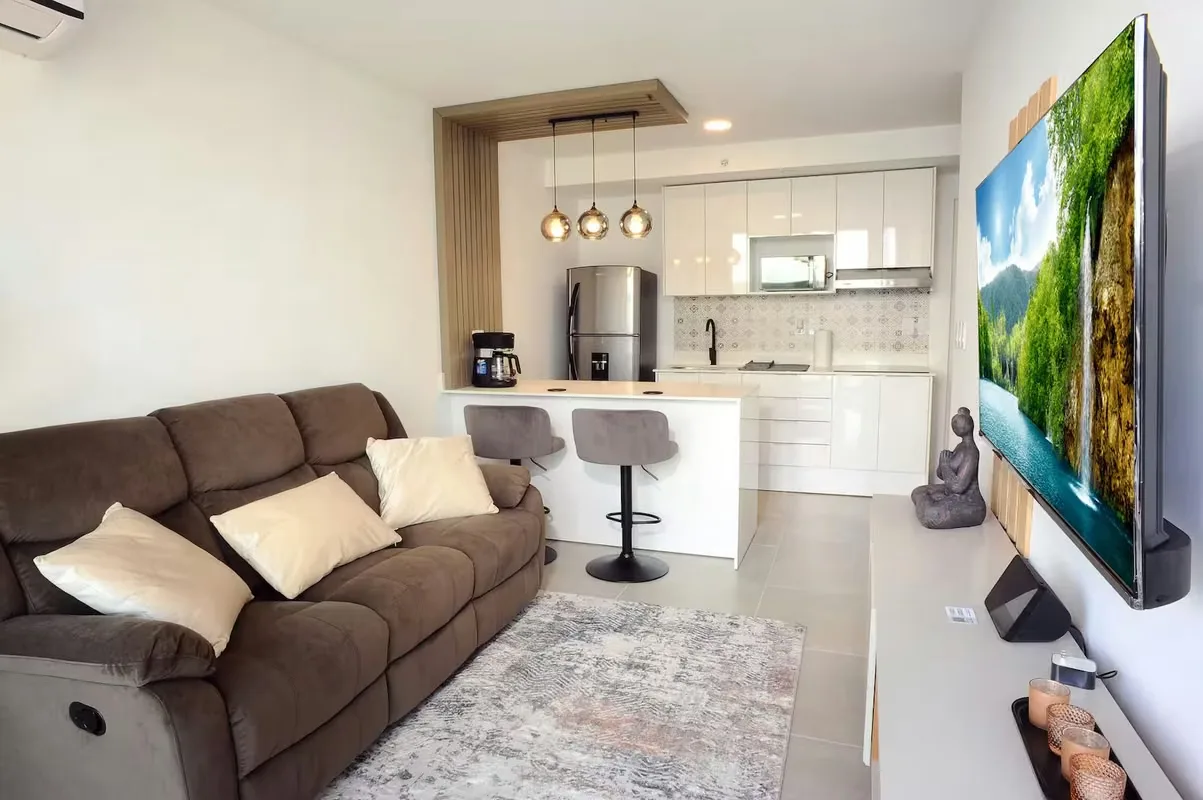 VENTA DE APARTAMENTO AMUEBLADO PARA INVERSIÓN DE 2 HABITACIONES CON PARQUEO