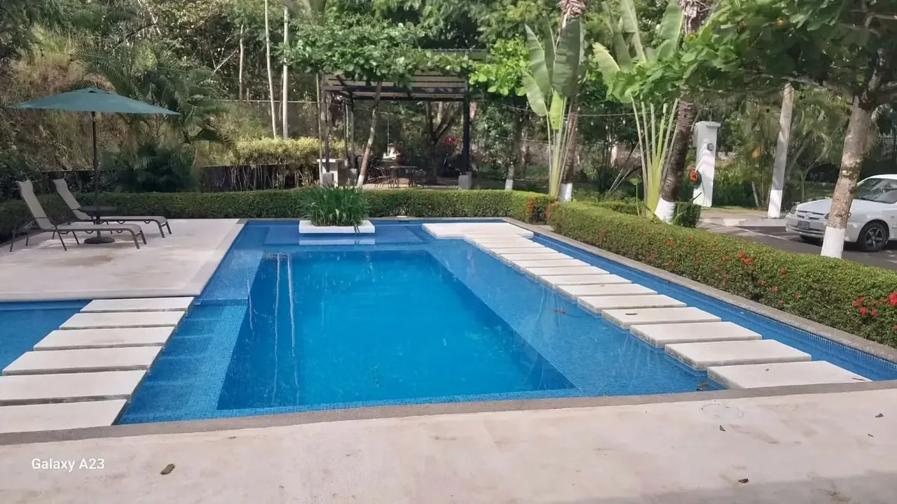 Discover an exceptional opportunity to build your custom dream home in the coveted Hacienda Jacó, an exclusive gated community located in the vibrant area of Jacó, Puntarenas, Costa ...