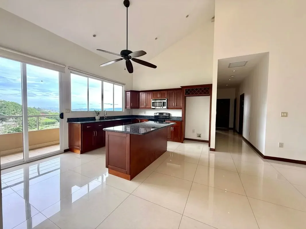 Situated on the top floor, this elegant colonial-style apartment features soaring ceilings that enhance the sense of space and fill the home with natural light. Its thoughtful layout, ...