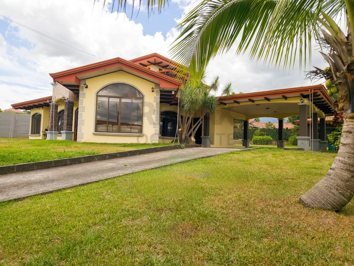 Home in a Private Gated Community with Pool and Spacious Garden