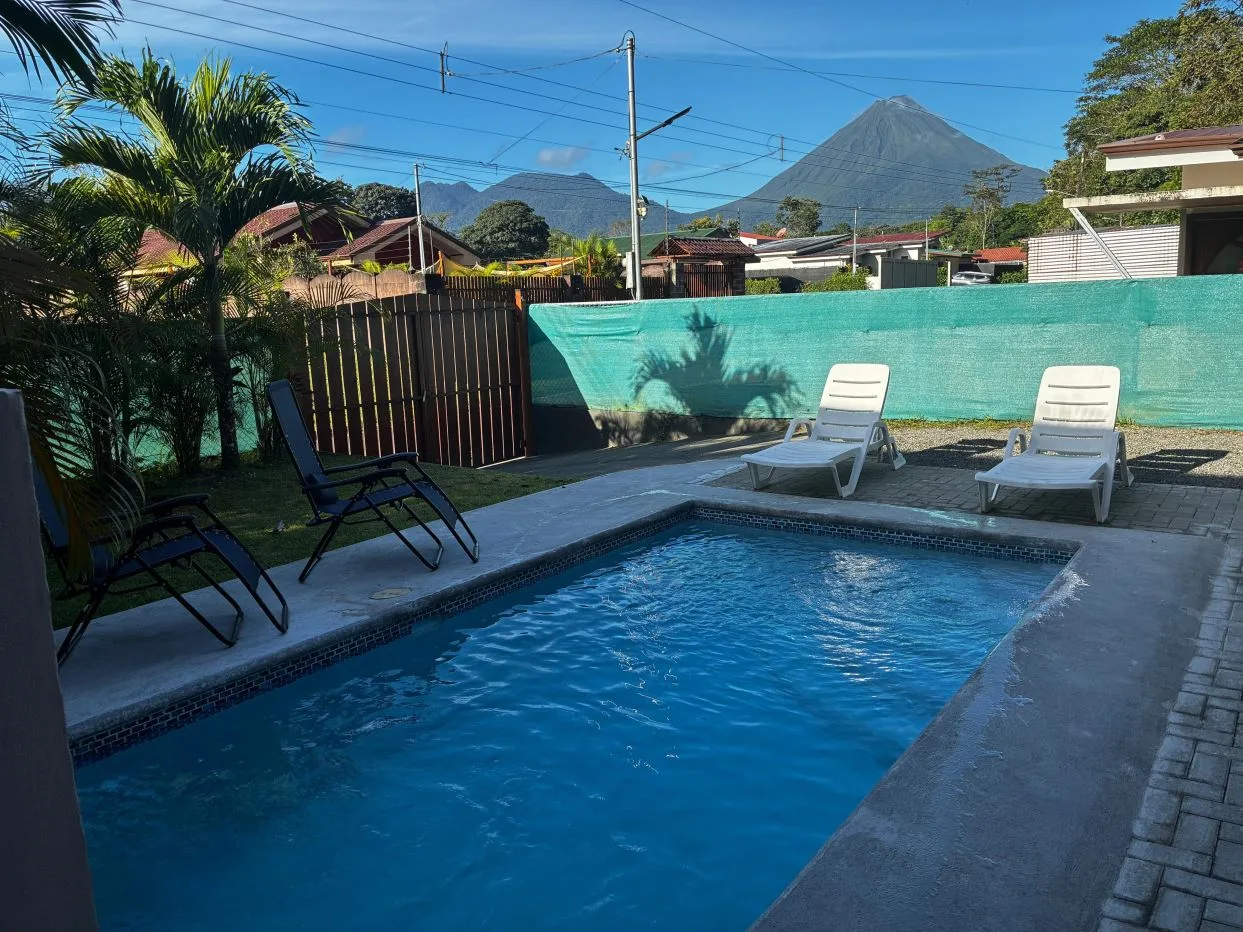 Turnkey 3BR Airbnb home for sale in gated community with a Pool just Minutes from La Fortuna