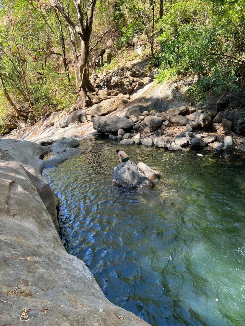 Beautiful 50 acre property adjacent to a natural swimming hole