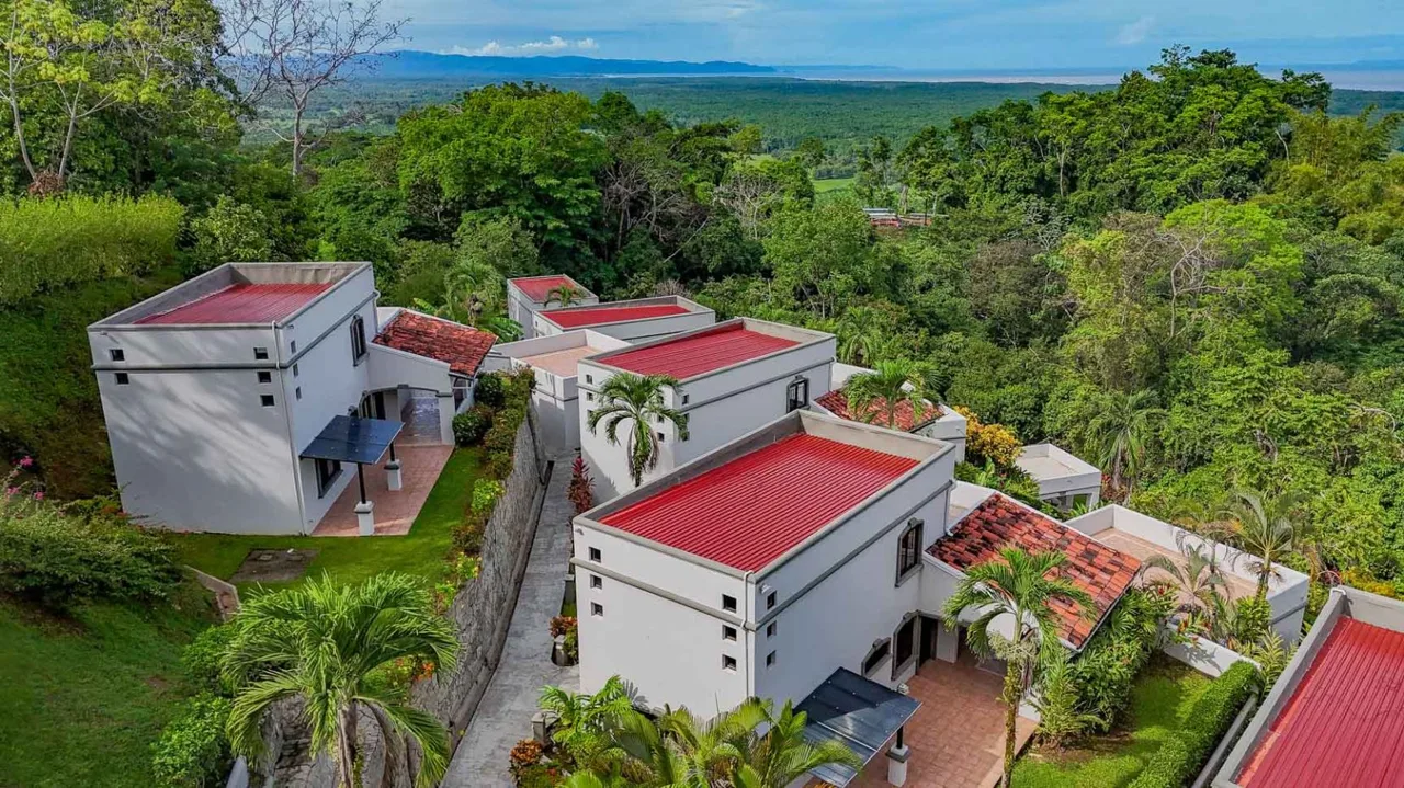 A secure neighborhood of sunny, Mediterranean-style 3 &amp; 1 bedroom villas with full amenities, jungle surrounds, tropical views
